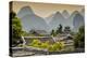 China 10MKm2 Collection - Chinese Buddhist Temple with Karst Mountains at Sunset-Philippe Hugonnard-Premier Image Canvas