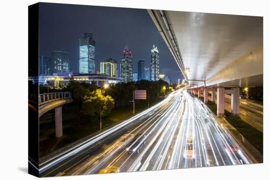 China, Shanghai, Blurred Image of Car and Bus Traffic of Yan'An Road-Paul Souders-Premier Image Canvas