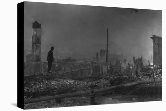 Chinese-American Man Against the Ruins of San Francisco's Chinatown. April 1906-null-Stretched Canvas