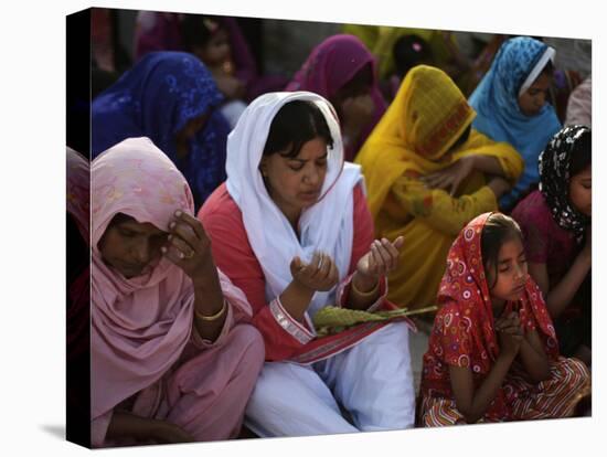 Christians Pray During a Ceremony to Celebrate Orthodox Palm Sunday, Outside a Church in Pakistan-null-Premier Image Canvas