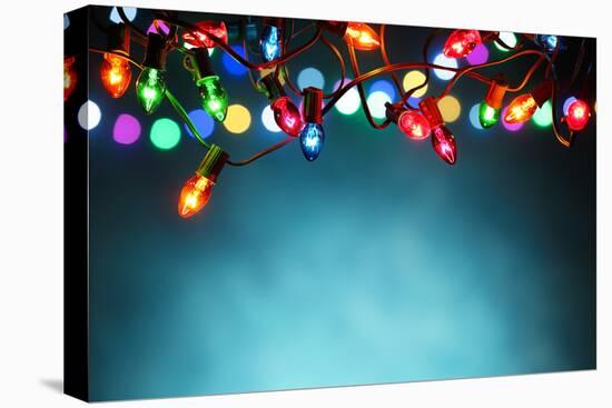Christmas Lights over Dark Blue Background-Sofiaworld-Premier Image Canvas