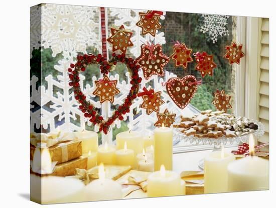 Christmassy Window Decorated with Biscuits and Candles-Linda Burgess-Premier Image Canvas