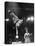 Circus Performer Balancer Unus Standing on His Index Finger on Globe Feet in Air Back of Head-Ralph Morse-Premier Image Canvas