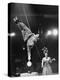 Circus Performer Balancer Unus Standing on His Index Finger on Globe Feet in Air Back of Head-Ralph Morse-Premier Image Canvas