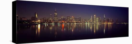 City skyline reflecting in Lake Michigan at night, Chicago, Illinois, USA-Panoramic Images-Premier Image Canvas