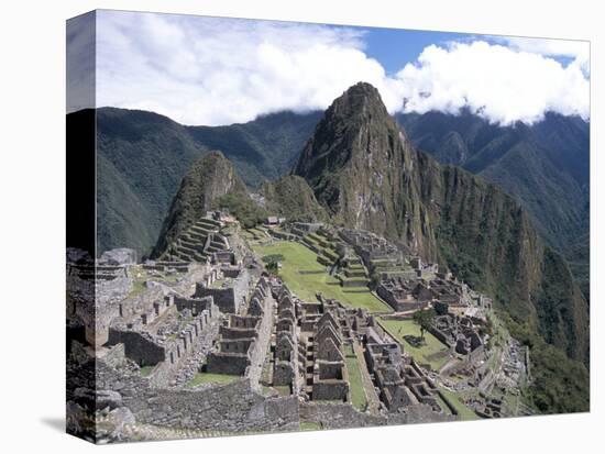 Classic View from Funerary Rock of Inca Town Site, Machu Picchu, Unesco World Heritage Site, Peru-Tony Waltham-Premier Image Canvas