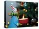 Close-Up of a Snow Man Candle in Front of a Tree with Christmas Lights-Winfred Evers-Premier Image Canvas