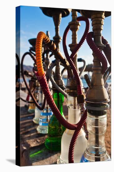 Close-up of shisha water pipes on Aqaba beach, Aqaba, Jordan-null-Premier Image Canvas