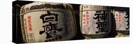 Close-up of Three Dedicated Sake Barrels, Imamiya Temple, Kita-Ku, Kyoto, Honshu, Japan-null-Premier Image Canvas