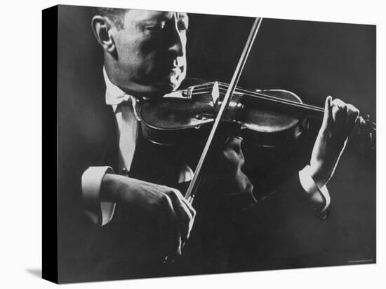 Close Up of Violinist Jascha Heifetz Playing in Mili's Darkened Studio-Gjon Mili-Premier Image Canvas