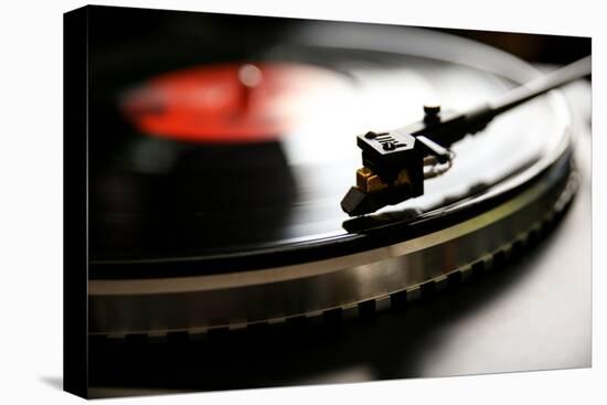 Close up View of Old Fashioned Turntable Playing a Track from Black Vinyl.-graphicphoto-Premier Image Canvas