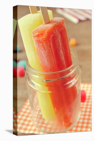 Closeup of Two Appetizing Ice Pops of Different Flavors in a Glass Jar-nito-Premier Image Canvas