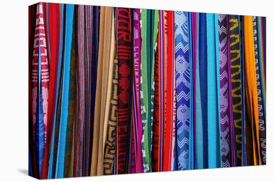 Cloths, Blankets, Scarves, and Hammocks Hang on Display at the Otavalo Market, in Otavalo, Ecuador-Karine Aigner-Premier Image Canvas