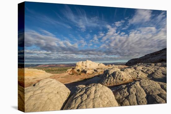 Clouds and textured sandstone landscape, Vermillion Cliffs, White Pocket wilderness, Bureau of Land-Howie Garber-Premier Image Canvas