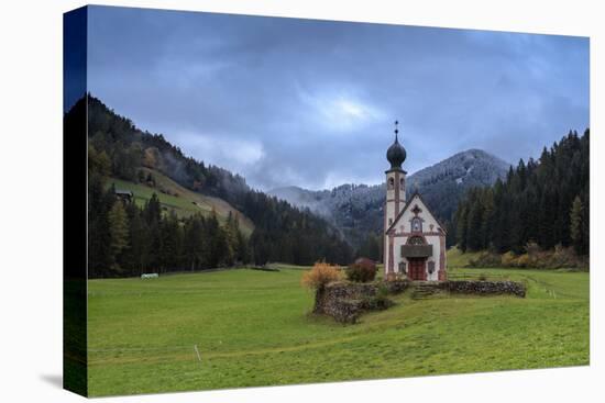 Clouds on Church of Ranui surrounded by meadows and woods in the fall, St. Magdalena, Funes Valley,-Roberto Moiola-Premier Image Canvas
