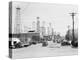 Clusters of Oil Derricks along Street-Philip Gendreau-Premier Image Canvas