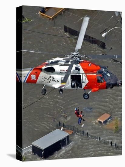 Coast Guard Rescues One from Roof Top of Home, Floodwaters from Hurricane Katrina Cover the Streets-null-Premier Image Canvas