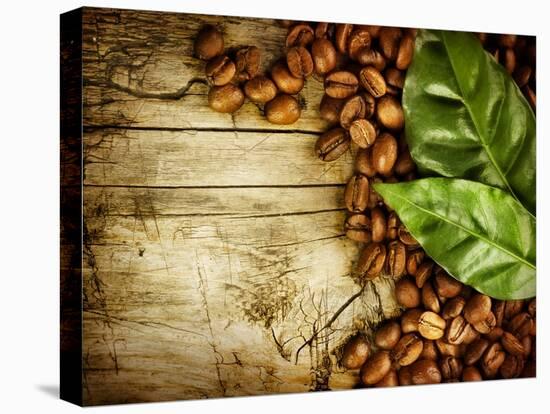 Coffee Beans Over Wood Background-Subbotina Anna-Stretched Canvas