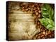 Coffee Beans Over Wood Background-Subbotina Anna-Stretched Canvas