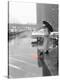 Color Pop,1950s WOMAN IN RAIN COAT HAT BOOTS HOLDING UMBRELLA CROSSING CITY STREET-null-Premier Image Canvas