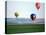 Colorful Hot Air Balloons Float over a Wheat Field in Walla Walla, Washington, USA-William Sutton-Premier Image Canvas