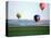 Colorful Hot Air Balloons Float over a Wheat Field in Walla Walla, Washington, USA-William Sutton-Premier Image Canvas