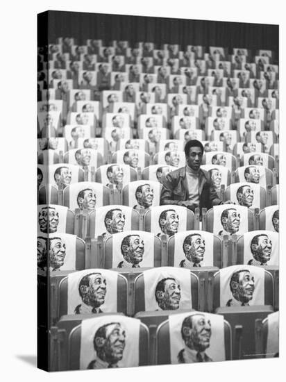 Comedian Bill Cosby Sitting in Empty Auditorium Filled with Copies of His Likeness on Each Seat-Michael Rougier-Premier Image Canvas