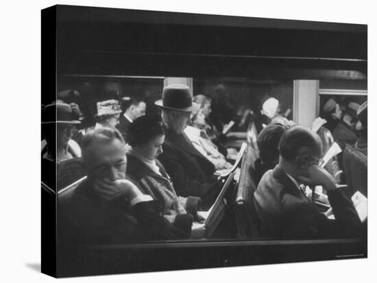 Commuters Reading on the Train-Walter Sanders-Premier Image Canvas