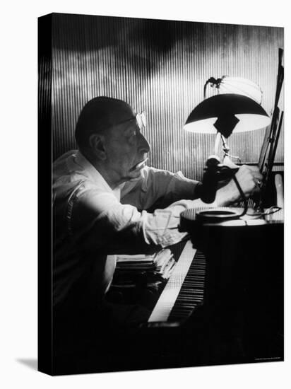 Composer Igor Stravinsky Working at a Piano in an Empty Dance Hall in Venice-Gjon Mili-Premier Image Canvas
