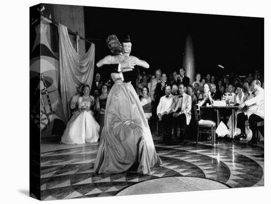 Conrad N. Hilton Hugging Mary Martin at Night Club, in the New Hotel's Ballroom-Yale Joel-Premier Image Canvas