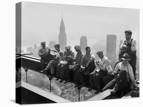 Construction Workers Take a Lunch Break on a Steel Beam Atop the RCA Building at Rockefeller Center-null-Premier Image Canvas