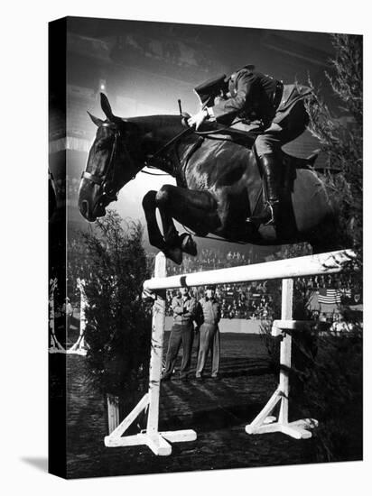 Contestant Jumping at the National Horse Show at Madison Square Garden-Gjon Mili-Premier Image Canvas