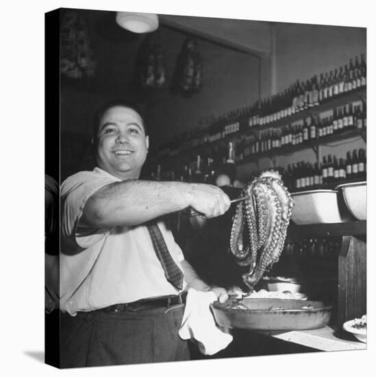 Cook in the Napoli Restaurant Holding up an Octopus, a Delicacy in Argentina-Thomas D^ Mcavoy-Premier Image Canvas