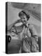 Correspondent Marguerite Higgins Smiling, Leaning Against Airplane-Carl Mydans-Premier Image Canvas
