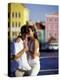 Couple at the Willemstad Waterfront, Curacao, Caribbean-Greg Johnston-Premier Image Canvas