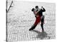 Couple dancing Tango on cobblestone road-null-Stretched Canvas