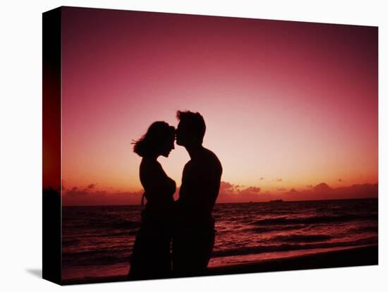 Couple Enjoying a Romantic Sunset on the Beach-Bill Bachmann-Premier Image Canvas