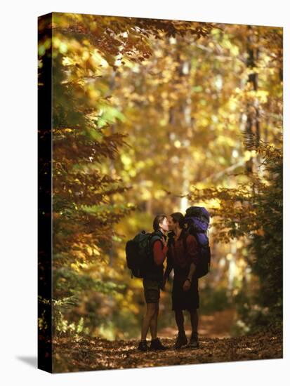 Couple Kissing on the Trail During a Hike-null-Premier Image Canvas