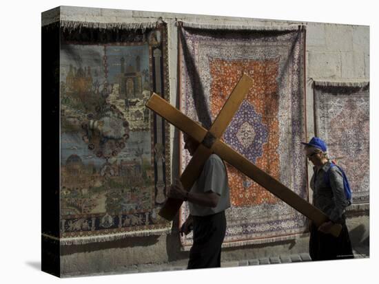 Couple of Pilgrims Carrying a Cross on the Via Dolorosa During Good Friday Catholic Procession-Eitan Simanor-Premier Image Canvas