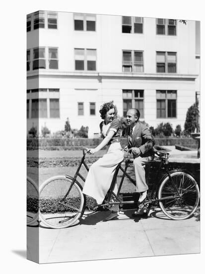 Couple Riding Tandem Bike-null-Stretched Canvas