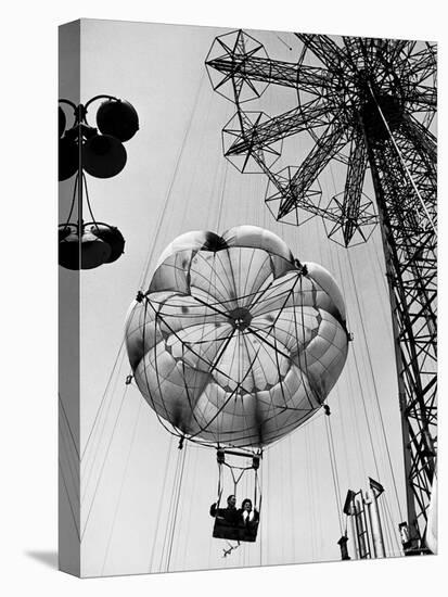 Couple Taking a Ride on the 300 Ft. Parachute Jump at Coney Island Amusement Park-Marie Hansen-Premier Image Canvas