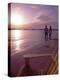 Couple Walking Along Beach at Sunset, Nassau, Bahamas, Caribbean-Greg Johnston-Premier Image Canvas