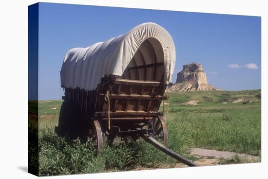 Covered Wagon on the Prairie Crossing of Oregon Trail and Mormon Trail Near Scotts Bluff, Nebraska-null-Premier Image Canvas