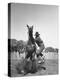 Cowboy Mounting a Horse-Carl Mydans-Premier Image Canvas