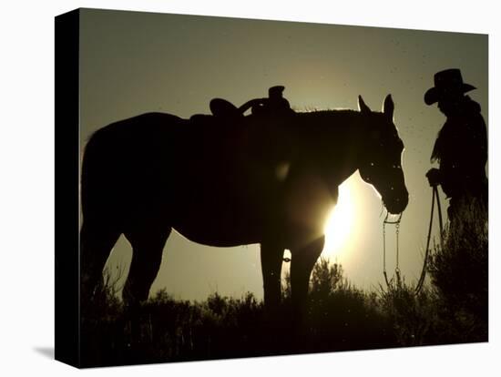 Cowboy With His Horse at Sunset, Ponderosa Ranch, Oregon, USA-Josh Anon-Premier Image Canvas