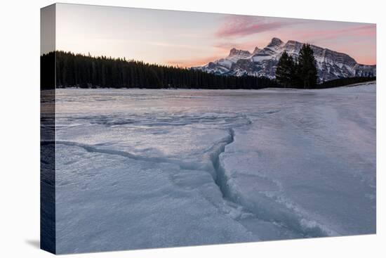 Cracks in ice on frozen lake at sunrise, Mount Rundle, Banff National Park, Alberta, Canada-null-Premier Image Canvas