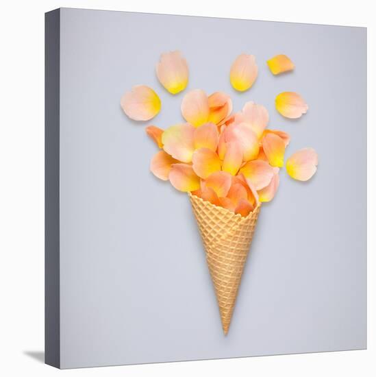 Creative Still Life of an Ice Cream Waffle Cone with Rose Petals on Grey-Fisher Photostudio-Premier Image Canvas