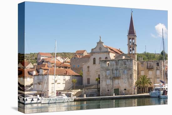 Croatia, Brac, Milna. Church of our Lady of the Annunciation 18th century dominates waterfront.-Trish Drury-Premier Image Canvas