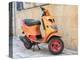 Croatia, Hvar. Bright orange vespa bike in the town of Hvar. (Editorial Use Only)-Julie Eggers-Premier Image Canvas