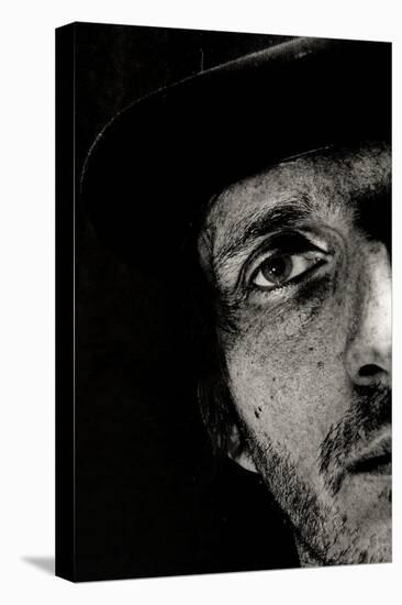 Cropped Portrait of a Man with Hat Starring into the Camera-Torsten Richter-Premier Image Canvas